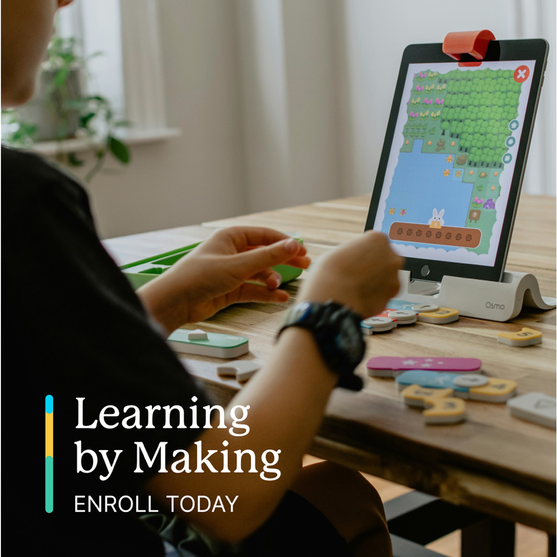Uable post: 'Learning by Making — Enroll Today', a child using a tablet